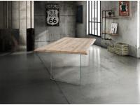 Foto tavolo moderno contemporaneo industrial con gambe vetro e piano in legno massello rovere scortecciato
