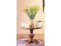 Foto tavolino in legno tondo con gamba tornita centrale per arredamento in stile classico arte povera