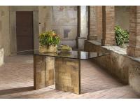 Foto tavolo da salotto con piano in vetro temprato e struttura in legno massello di olmo vecchio intarsiato