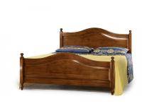 Foto letto matrimoniale sagomato lucidato noce