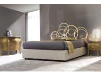 Foto giroletto matrimoniale, con contenitore, in ferro battuto.