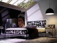 Foto letto matrimoniale in ferro battuto.