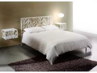 Foto giroletto matrimoniale in ferro battuto.