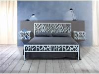 Foto letto matrimoniale in ferro battuto.