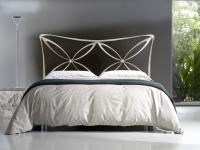 Foto giroletto matrimoniale in ferro battuto.