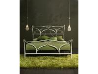 Foto letto matrimoniale in ferro battuto.