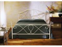 Foto letto matrimoniale in ferro battuto.