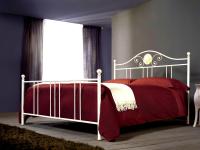 Foto letto matrimoniale in ferro battuto.
