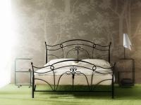 Foto letto matrimoniale in ferro battuto.