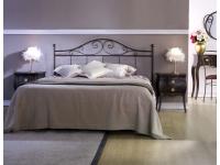 Foto giroletto matrimoniale in ferro battuto.