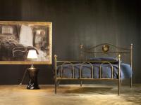 Foto letto a una piazza e mezza in ferro battuto.