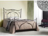 Foto letto a una piazza e mezza in ferro battuto.