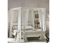 Foto letto a baldacchino in legno