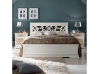 Foto letto a 2 piazze con testata traforata in stile moderno contemporaneo