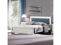 Foto letto matrimoniale in legno con testata imbottita per arredi in stile contemporaneo moderno