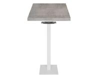 Foto tavoli alti la spezia per arredo bar ristorante con basamento in ghisa bianca e piano grigio cemento