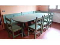 Foto composizione soggiorno in legno, stile rustico, colore verde.