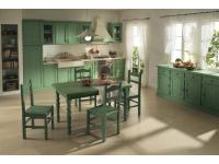 Foto cucine in legno massello di pino in stile provenzale color verde per arredo casa baita chalet